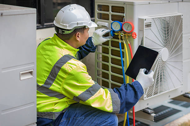 Professional Ac Installation technician working in Manns Harbor, NC